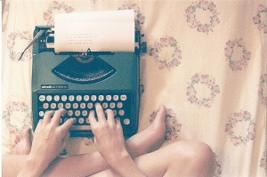 writer on a typewriter